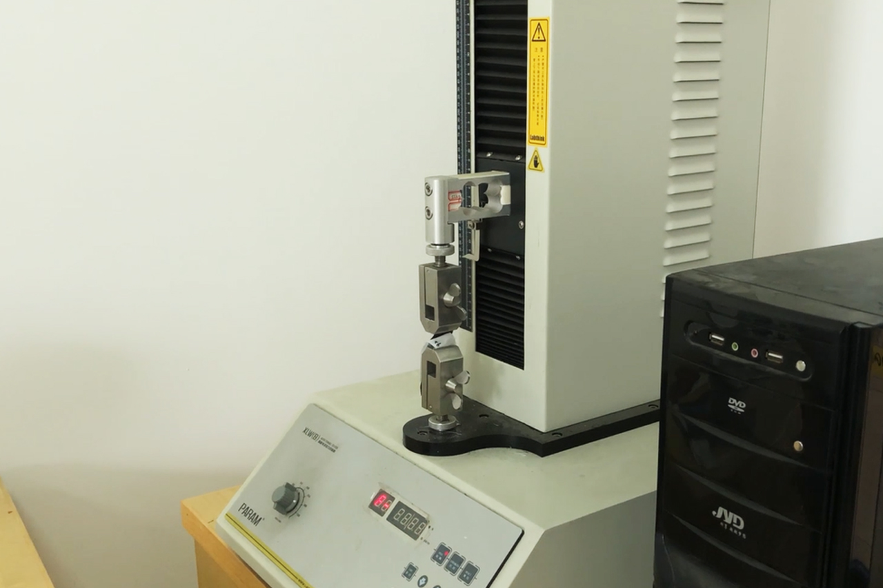 羽絨服復(fù)合剝離測試